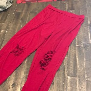 Red sweat style pants
